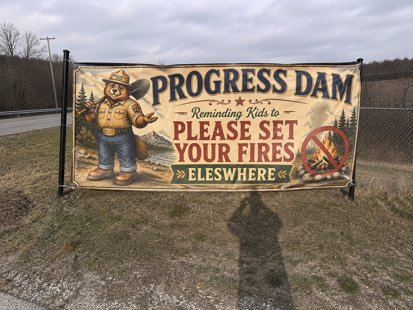 Photograph of the Progress Dam fire safety banner on Lakeview Drive